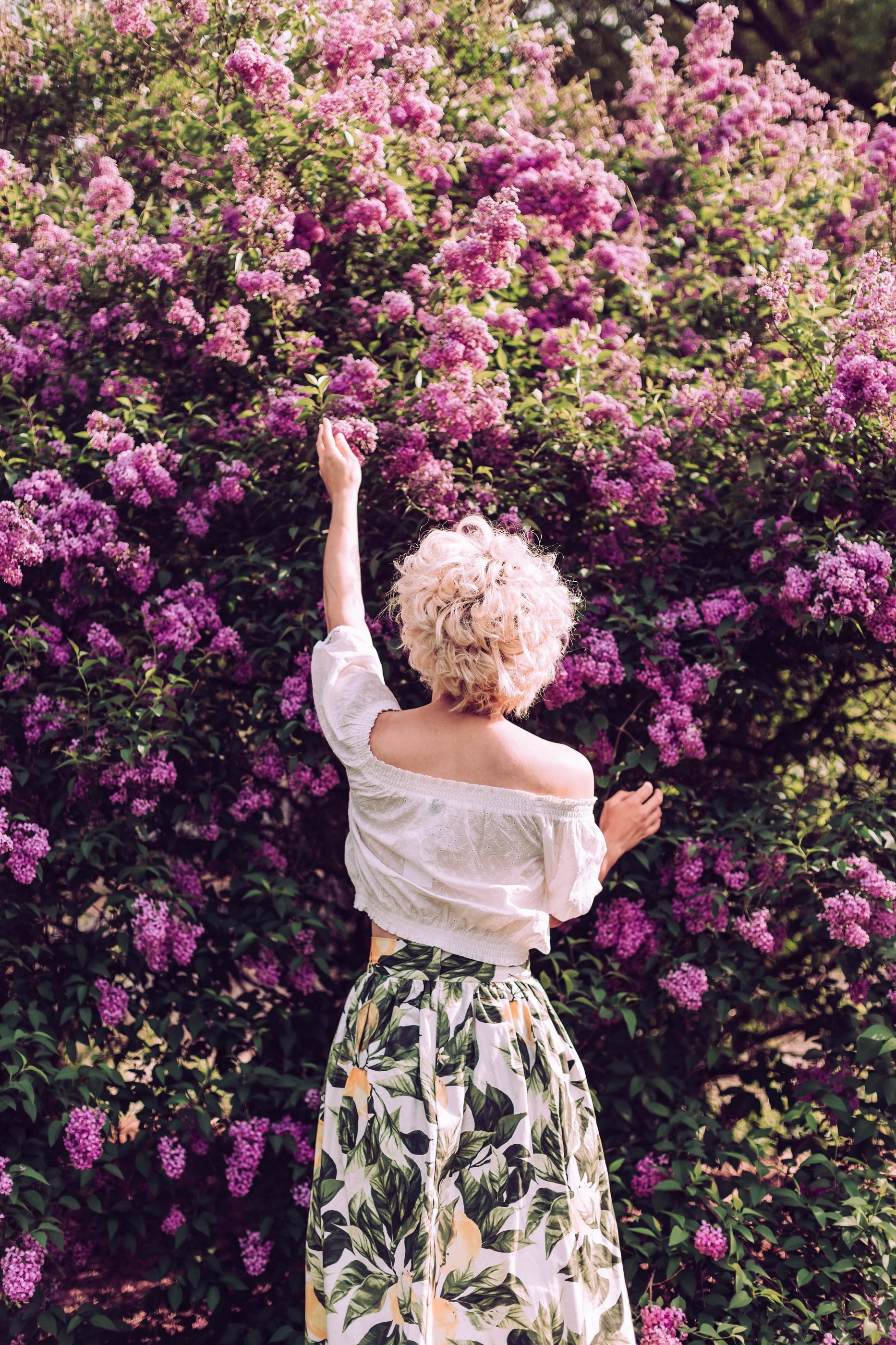 pretty-young-woman-is-standing-next-lilac-bush-en-2021-09-03-02-53-30-utc.jpg