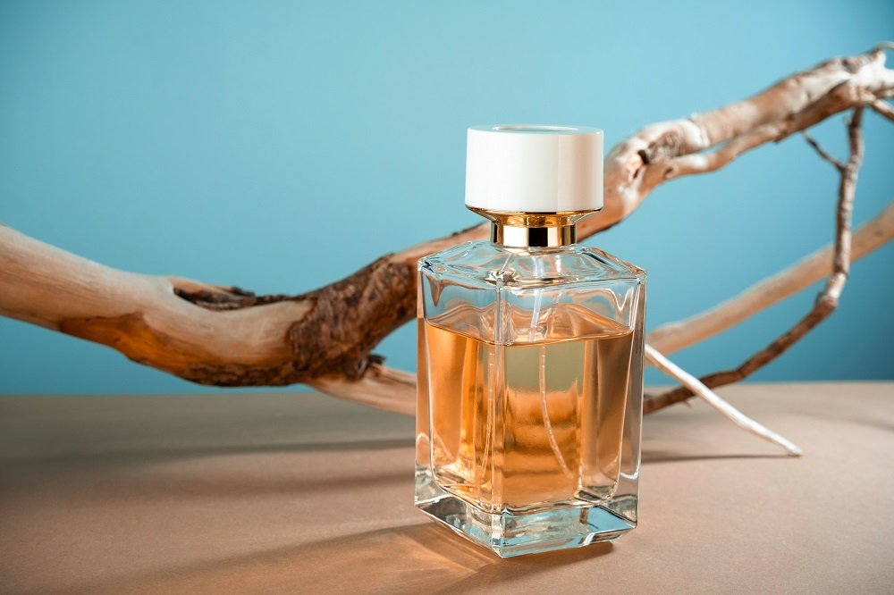 transparent-mock-up-glass-perfume-bottle-on-blue-b-2021-10-28-20-57-24-utc.jpg
