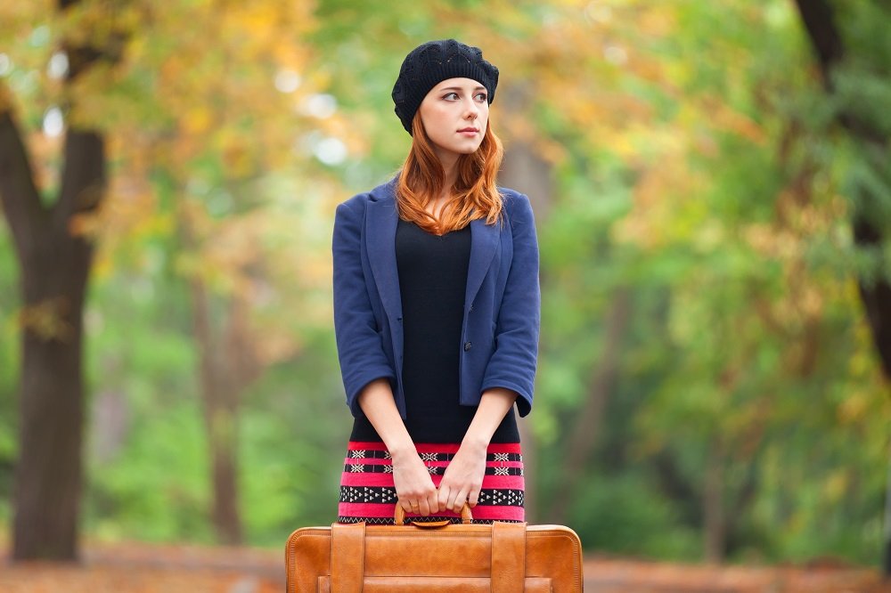 redhead-girl-with-suitcase-at-autumn-outdoor-2022-01-13-20-58-18-utc.jpg